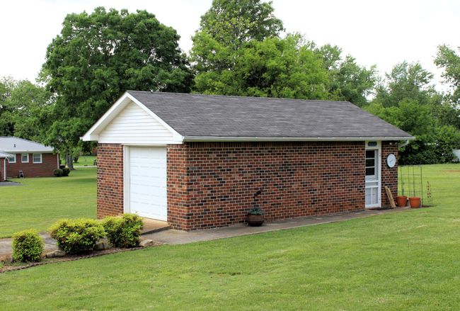 The workshop will hold your lawn equipment or possibly your tools too!! | Image 6