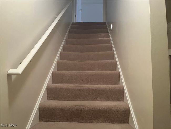 Come on to the Basement down the carpeted stairs. | Image 18