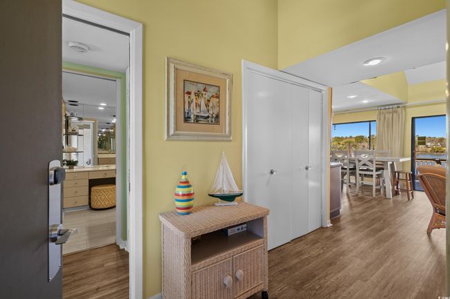 Hall featuring recessed lighting and wood finished floors | Image 6