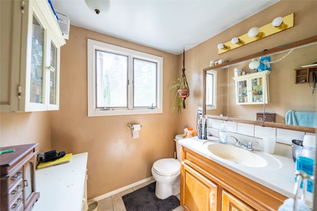 Bathroom featuring vanity and tile patterned floors | Image 46