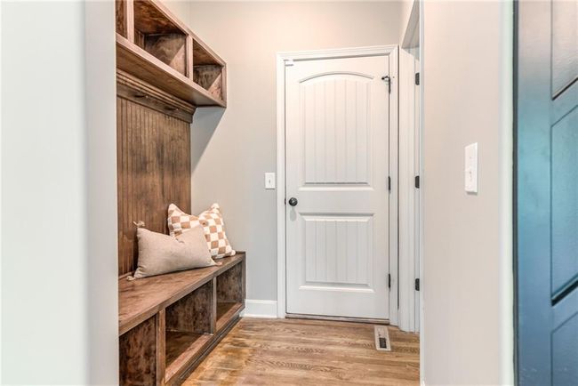 Mudroom with light wood-type flooring and baseboards | Image 20