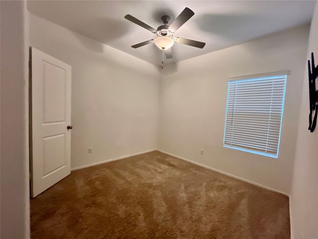 Spare room with carpet and a ceiling fan | Image 14