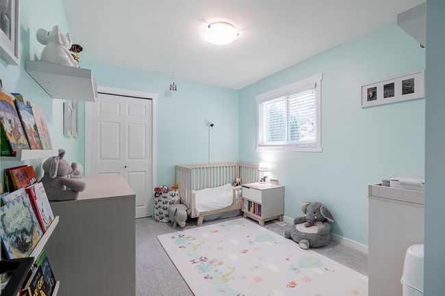 Bedroom with a closet and baseboards | Image 22