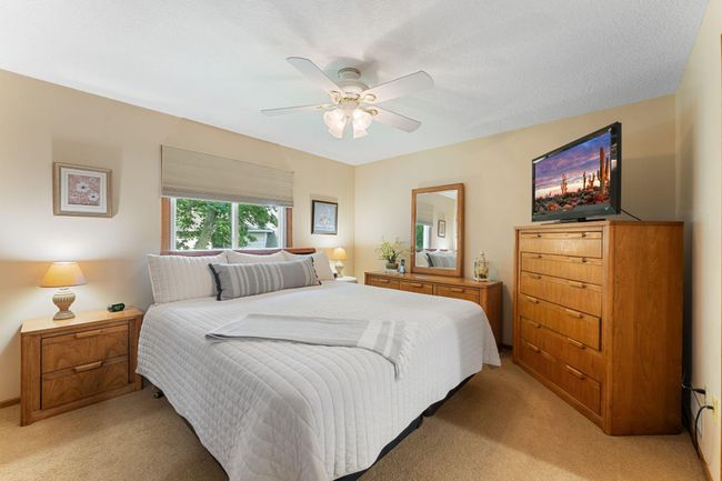 Upstairs you'll find the primary bedroom. | Image 15