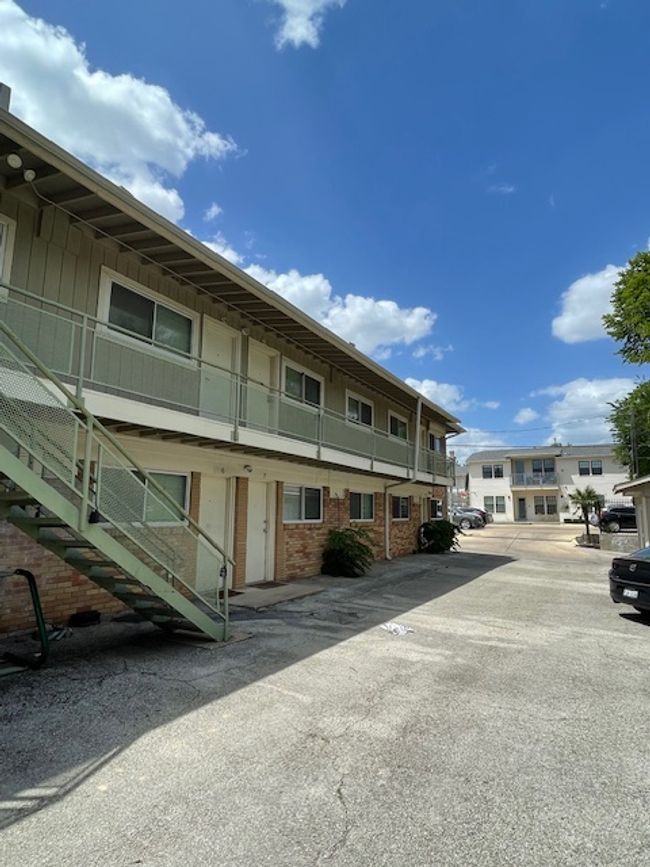View of building exterior with stairs | Image 16