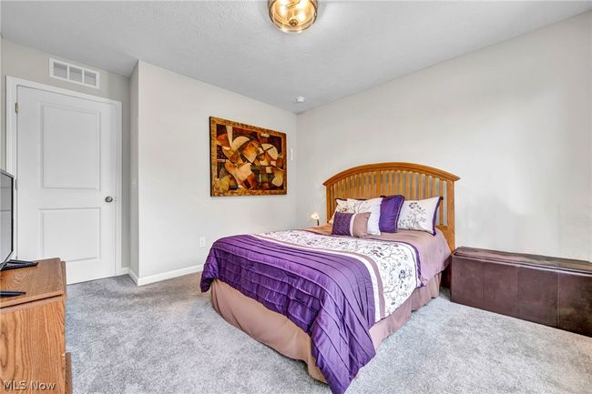 View of carpeted bedroom | Image 30