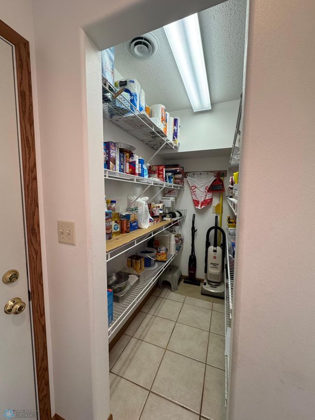 Pantry & Access to Attached Garage | Image 35