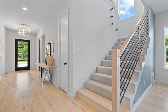 Foyer featuring wood finished floors, stairs, and recessed lighting | Image 21