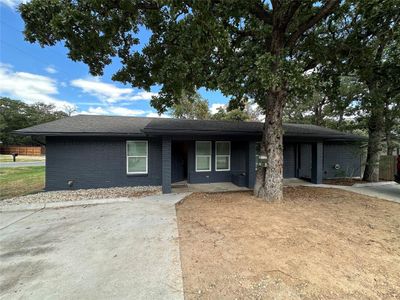 View of ranch-style house | Image 1