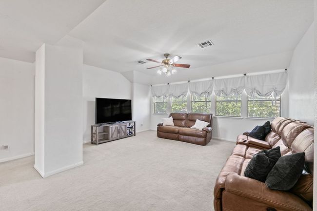 Living area featuring carpet and a ceiling fan | Image 15