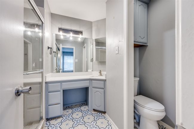 Full bath featuring vanity and tile patterned floors | Image 9