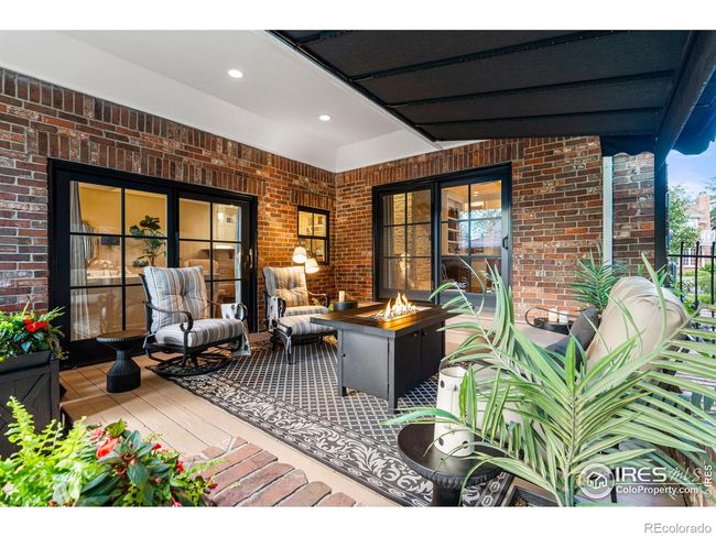Covered Outdoor Patio with new French Doors, Decking, and Ceiling Covering. | Image 31