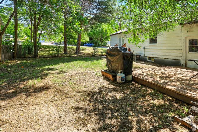 View of yard featuring a deck | Image 28