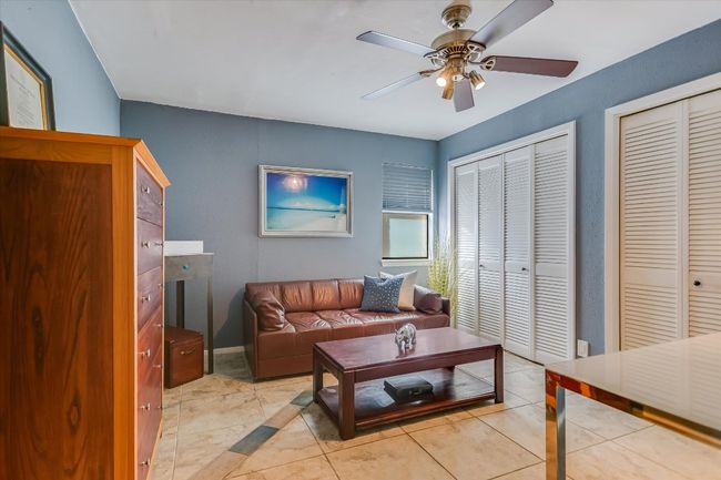 The second bedroom features two sizable closets. | Image 9