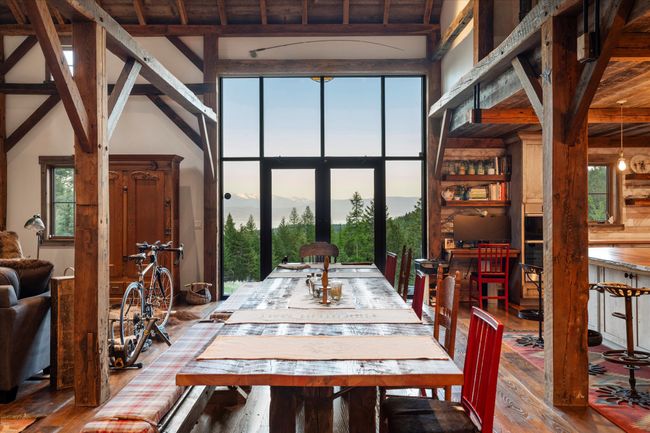 Handcrafted owner-design 14 foot dinning table begs to round up the posse for an evening of good food and conversation | Image 11