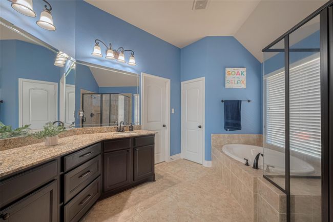 The kitchen opens to the family room, keeping the cook connected and part of the action. PLEASE NOTE , KITCHEN ISLAND PAINTED WHITE! | Image 20