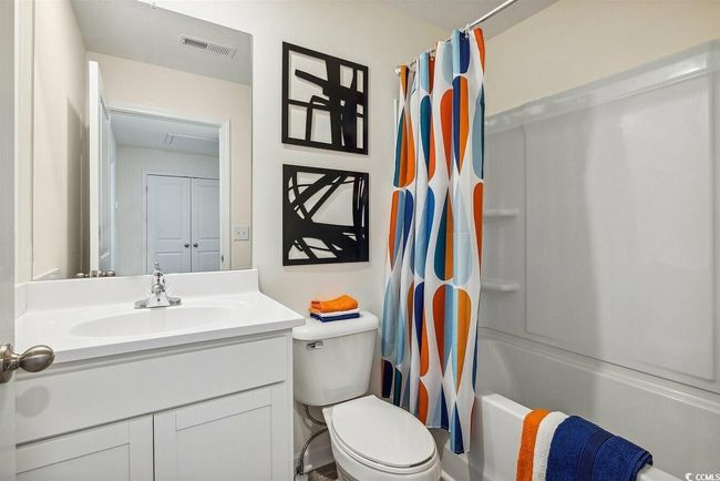 Bathroom with vanity and shower / bath combo | Image 25