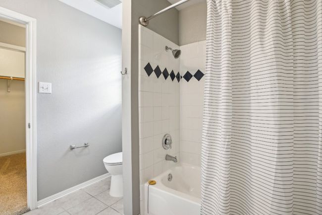 Immaculately maintained bathrooms with modern updates throughout. | Image 25