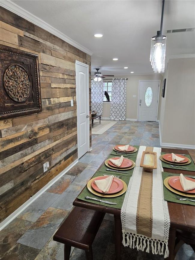 View of dining area towards front door. Bedrooms to the left - moving right you walk into the kitchen or utility room then into Flex space. | Image 28