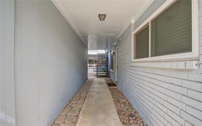 Condo is located in the back of the community in a corner | Image 17