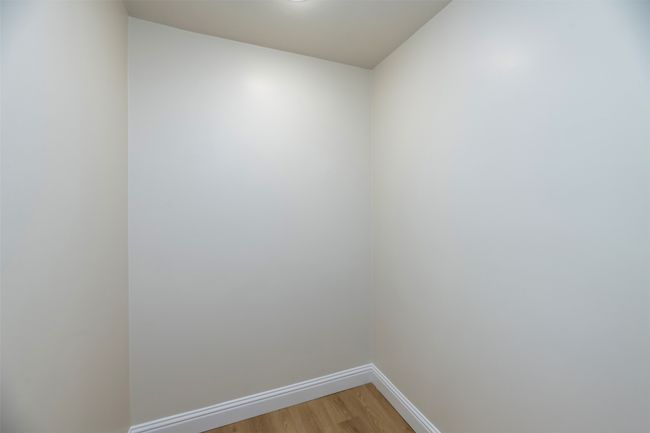 Unfurnished room with light wood-style floors and baseboards | Image 13