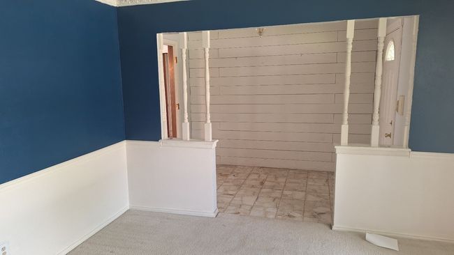 View of carpeted dining room | Image 14