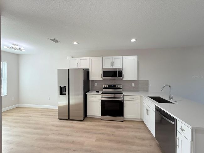 12223 Kirk Ave, Home with 6 bedrooms, 4 bathrooms and null parking in Port Charlotte FL | Image 21