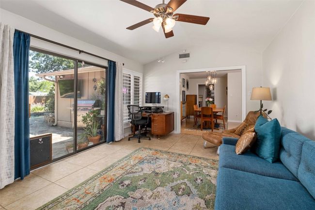 Sun room when previously furnished - check out that perfect spot for a desk and work station by the window! | Image 15