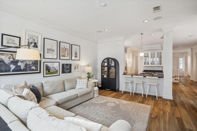 Another view of the family room looking back at the kitchen and all the way to the front door! Open concept living! | Image 14