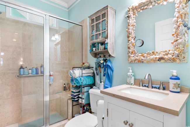 Bathroom featuring vanity, ornamental molding, toilet, and a shower​​‌​​​​‌​​‌‌​‌‌​​​‌‌​​‌‌​‌​​​​​‌ stall | Image 21