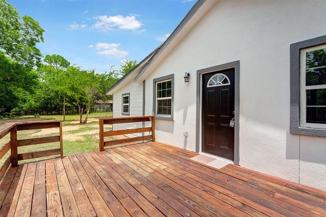 View of wood style deck | Image 13