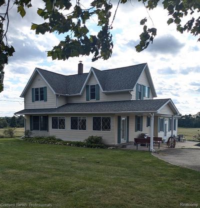 4575 Van Dyke Road, Home with 4 bedrooms, 2 bathrooms and null parking in Burnside Twp MI | Image 2