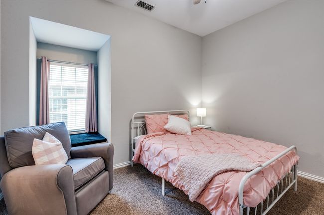 Bedroom with window seat, walk in closet and jack and jill bath | Image 21