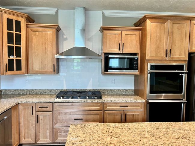 Gas cook top with stainless steel hood | Image 11
