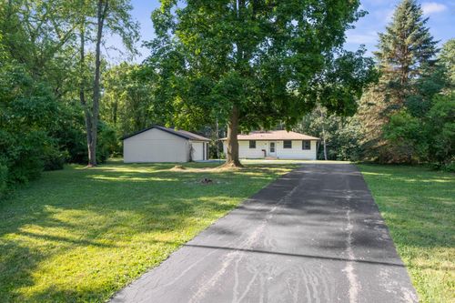 728 Buth Dr Ne, Comstock Park, MI, 49321-8207 | Card Image