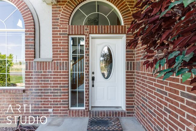 Entrance to property with brick siding | Image 7
