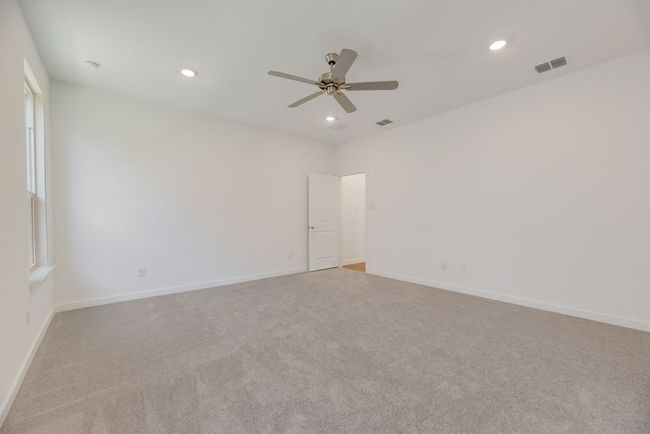Carpeted spare room featuring recessed lighting and ceiling fan | Image 20