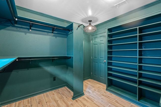Fourth bedroom has been reinvented as bespoke dressing room/closet. | Image 21