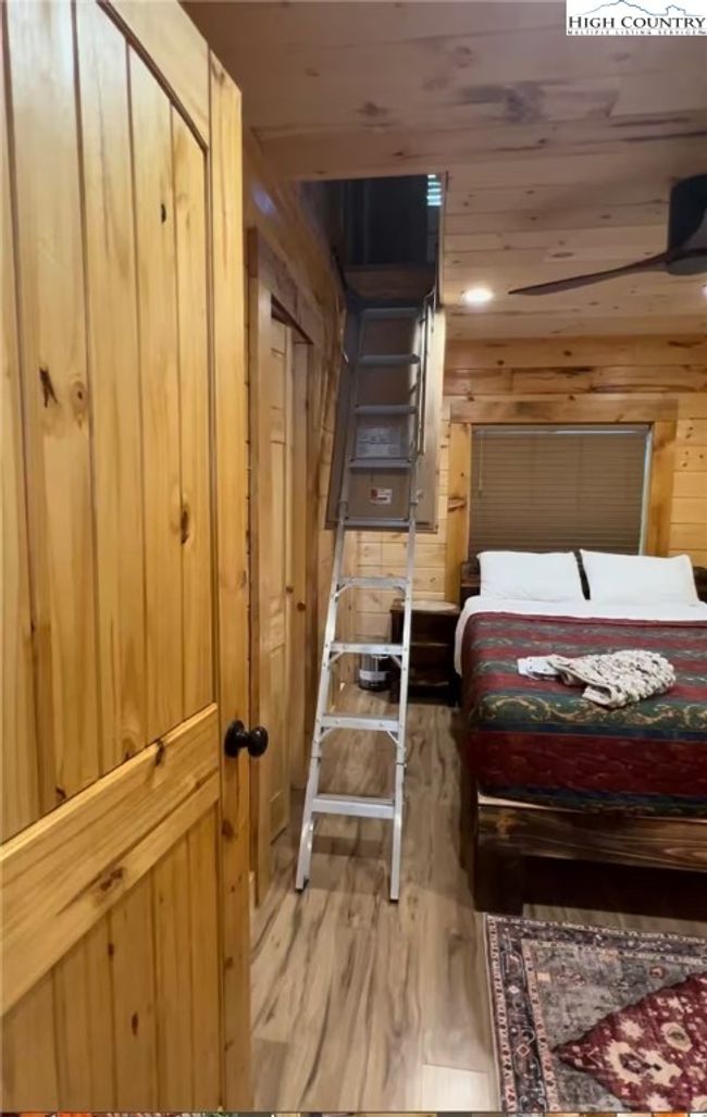 Bedroom 1 stairs to loft | Image 11