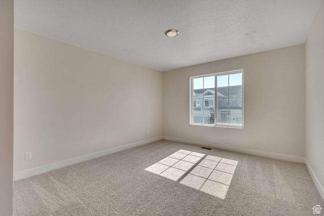 Carpeted empty room with baseboards | Image 20