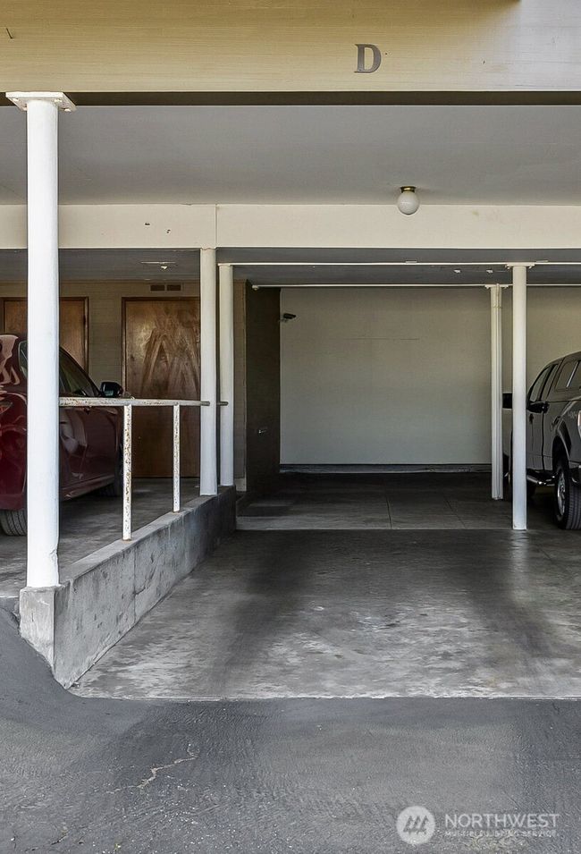 Two car covered parking, tandem style, with easy access from elevator. | Image 26