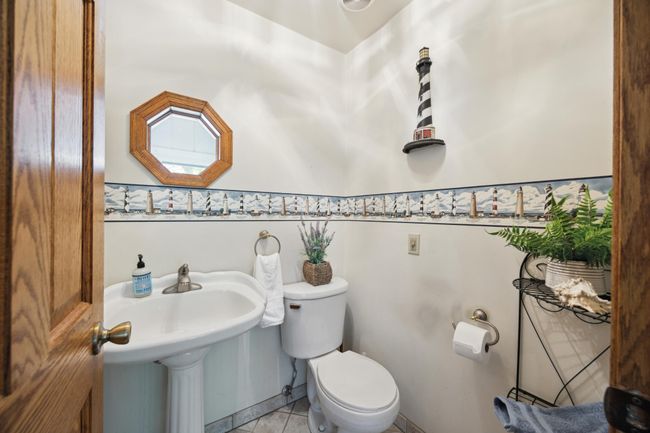 this is the 1/2 bath on the main level just off the family/dining room. | Image 7