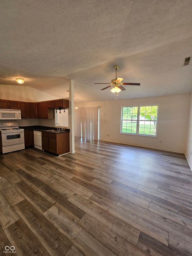 Very open concept, view of living room, dining and kitchen | Image 7