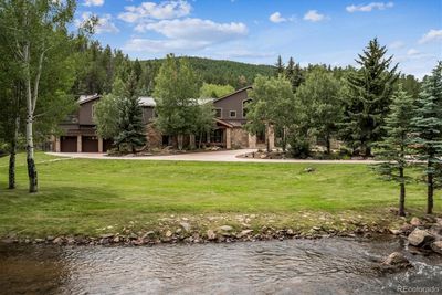 33114 Upper Bear Creek Road, House other with 5 bedrooms, 3 bathrooms and 5 parking in Evergreen CO | Image 2