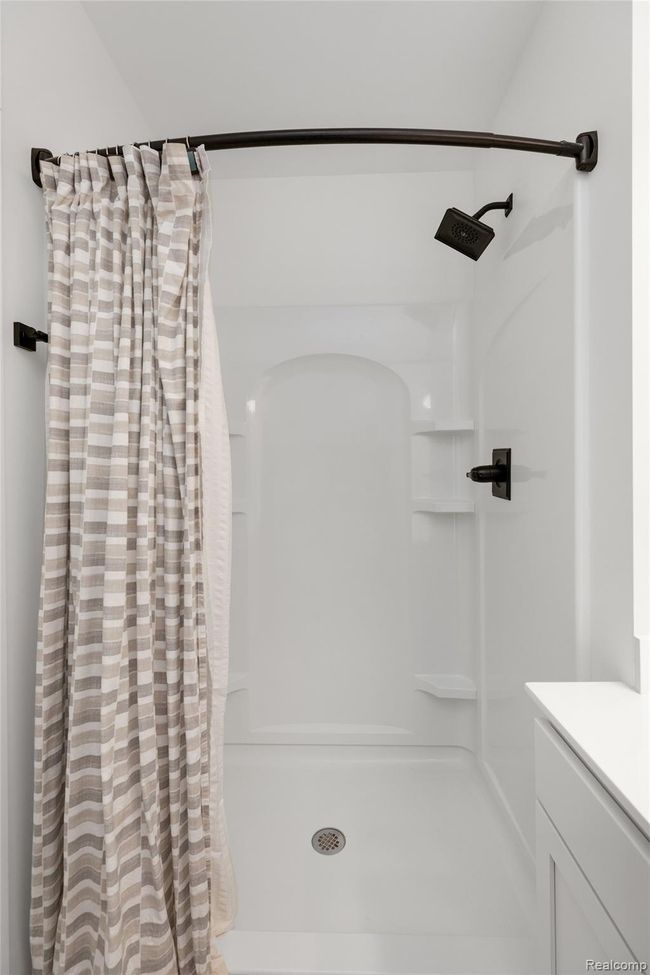 Primary bedroom with walk-in shower | Image 23