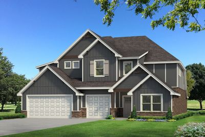 Craftsman-style house featuring a garage and a front yard | Image 2