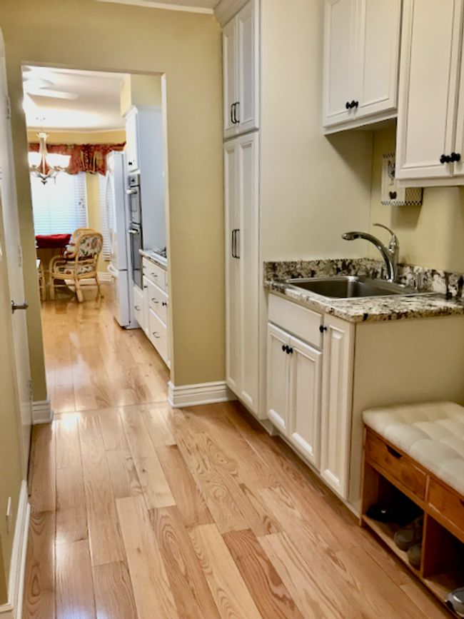 Adjoining Kitchen with Additional Cabinetry | Image 11