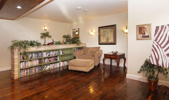 This cozy reading nook in the great room would be ideal for relaxing with a good book, or a great place for a home library for the family. | Image 6