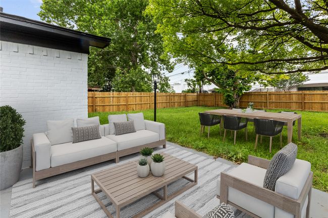Wooden deck featuring an outdoor living space | Image 4