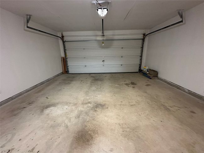 Garage featuring a garage door opener | Image 20